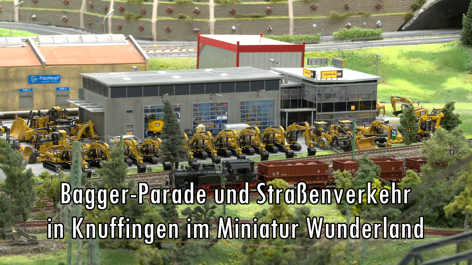 Modellautos und Bagger - Selbstfahrende Autos auf der Eisenbahnanlage in Knuffingen im Miniatur Wunderland